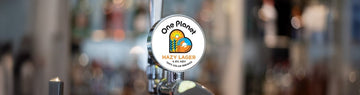 One Planet Hazy Lager lands - Hogs Back Brewery