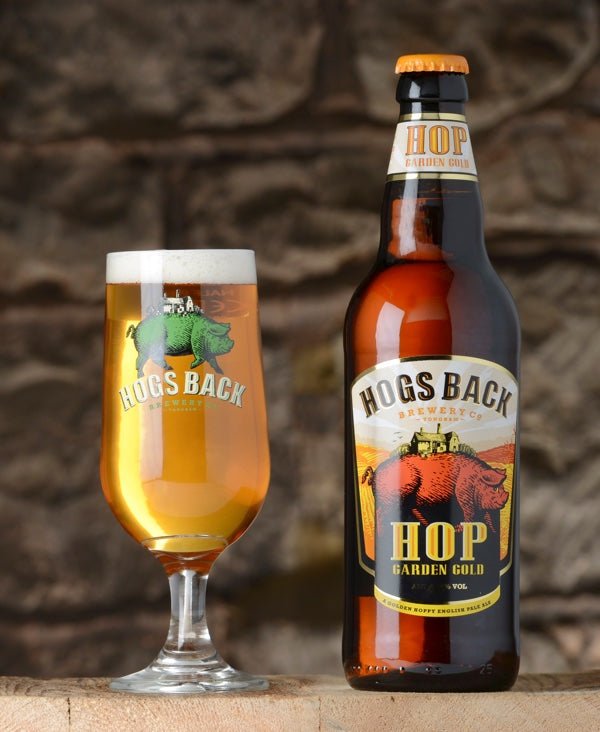 Bottle of Hog Garden Gold beer with half pint glass - Hop Garden Gold x12 - Hogs Back Brewery